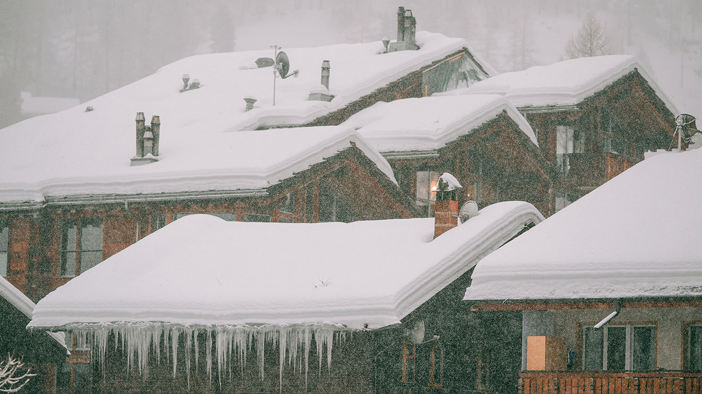 A picture of snow covered roofs in winter