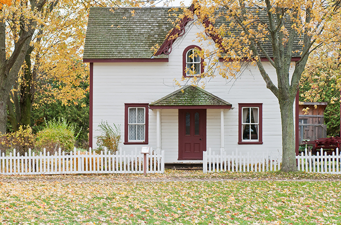 Image of home exterior in autumn. Be sure to do an inspection of your home's outside before winter hits