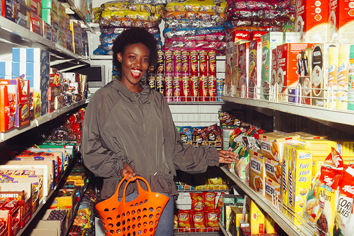 Image of woman in pantry. Stock up on essentials before winter hits