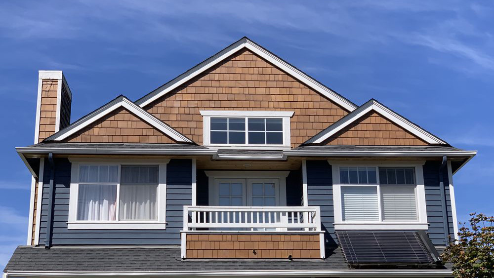 Image of front of home resided by EcoSide